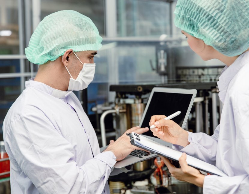 Quality control and food safety team inspection the product standard in the food and drink factory